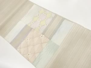 絽綴れ変わり横段に花々模様織出し名古屋帯